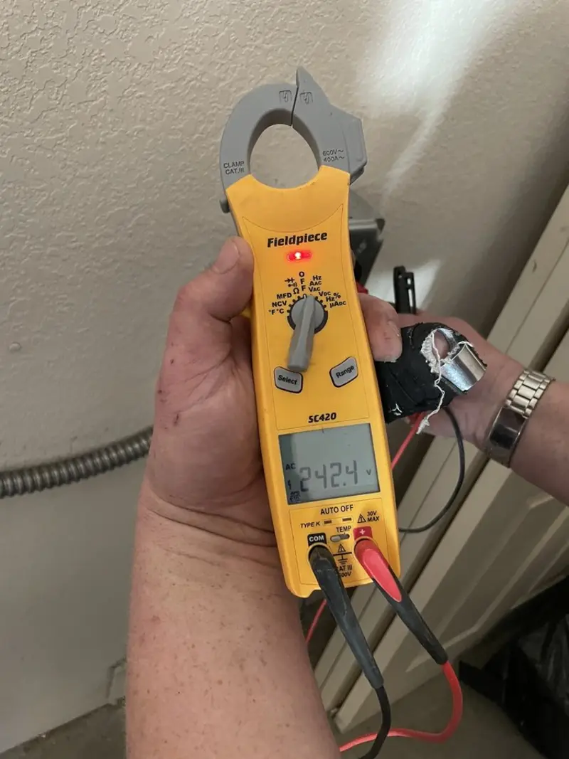 Voltage testing with clamp meter during Generator Installation in Maple Valley